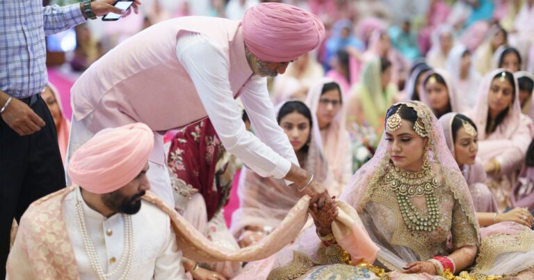 anand-karaj-ceremony-sikh-wedding-chandigarh-06 Anand Karaj ceremony Sargun Kanwar Sikh wedding Gurdwara Chandigarh Couple taking Lavaan Sikh wedding ceremony photography Granthi conducting Anand Karaj Sikh wedding Chandigarh Couple with rumala Sikh wedding ceremony tradition Sacred Sikh wedding ceremony Guru Granth Sahib Chandigarh