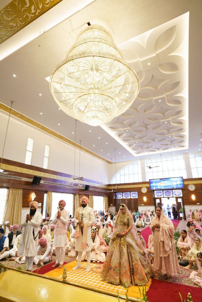 anand-karaj-ceremony-sikh-wedding-chandigarh-10 Anand Karaj ceremony Sargun Kanwar Sikh wedding Gurdwara Chandigarh Couple taking Lavaan Sikh wedding ceremony photography Granthi conducting Anand Karaj Sikh wedding Chandigarh Couple with rumala Sikh wedding ceremony tradition Sacred Sikh wedding ceremony Guru Granth Sahib Chandigarh