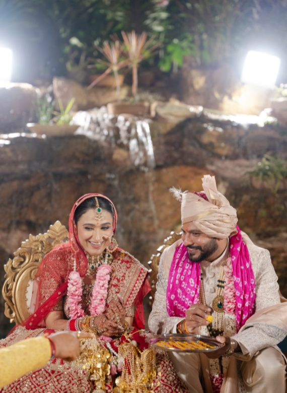 Bride and groom exchanging rituals during wedding ceremony captured by Parshant Sharma Photography in Mohali