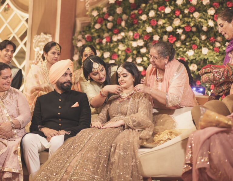 reception-couple-portrait-sikh-wedding-05 Sangeet night dance performance Sargun Kanwar Sikh wedding Chandigarh Dhol player Punjabi wedding sangeet celebration Bhangra dancing Sikh wedding sangeet Chandigarh