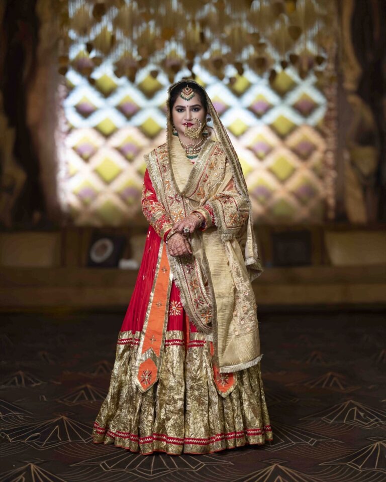 bride-full-outfit-red-lehenga-portrait-01 Full-length portrait of bride in stunning red bridal lehenga with complete jewelry set