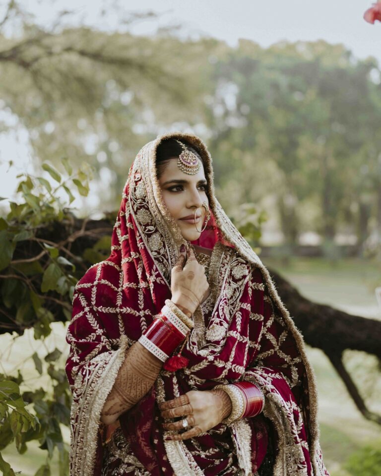 bride-full-outfit-red-lehenga-portrait-06 Full-length portrait of bride in stunning red bridal lehenga with complete jewelry set